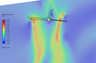 Velocity magnitude contour on a vertical plane through the rotating fan blades